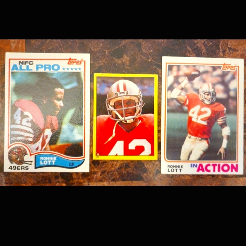 Ronnie Lott 12 pc lot including 1982 Rookie cards and rare sticker, & 2nd year.